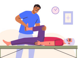 A man helps an older man during a physical therapy session.